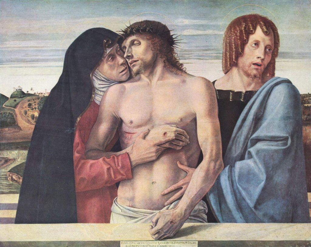 Pietà di Giovanni Bellini, la Madonna abbraccia il volto di Cristo morto
