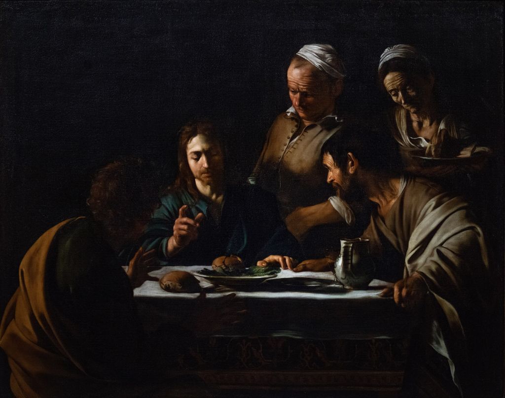 Cena in Emmaus di Caravaggio, quattro uomini a tavola in una stanza buia